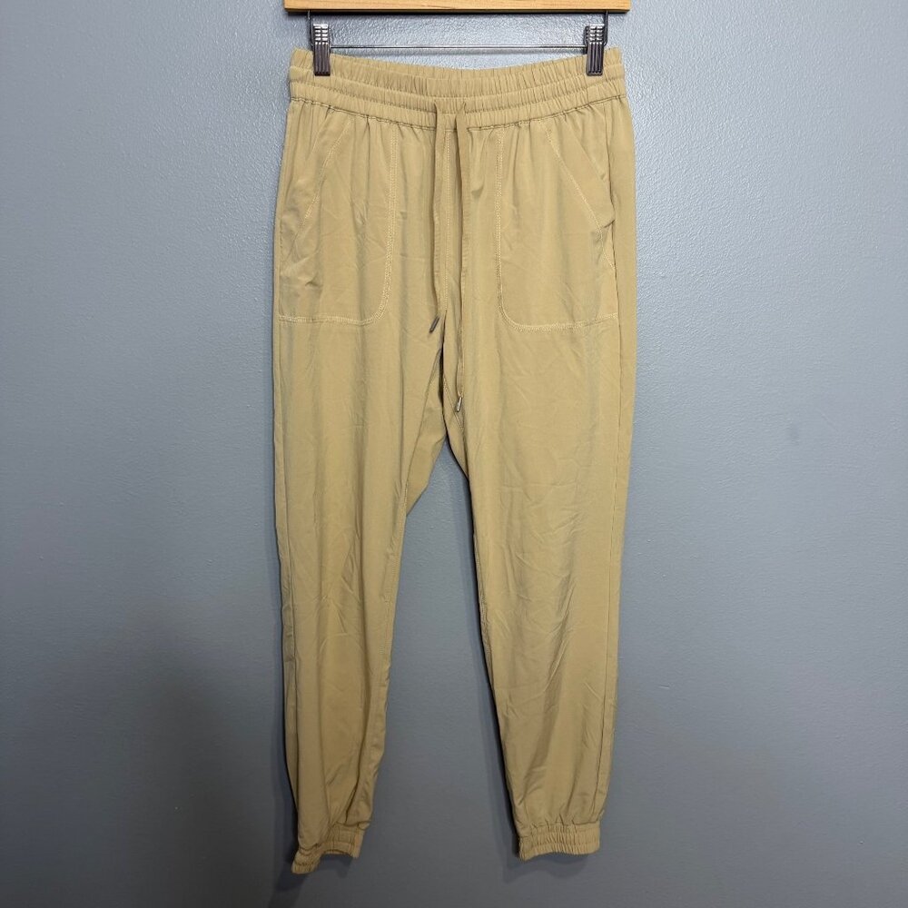 TNA ARITZIA speed jogger in khaki tan size S